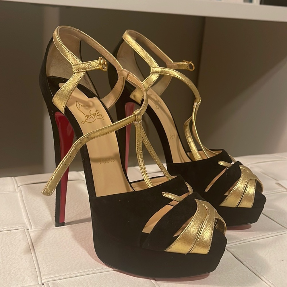 Christian Louboutin black suede and gold heel